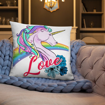 Coussin licorne love blanc sur canapé 55x55